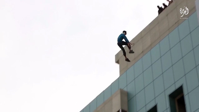 watch-new-isis-execution-compilation-video-shows-gay-man-thrown-from-roof-heavycom-mp4-00 07 18 01-still001