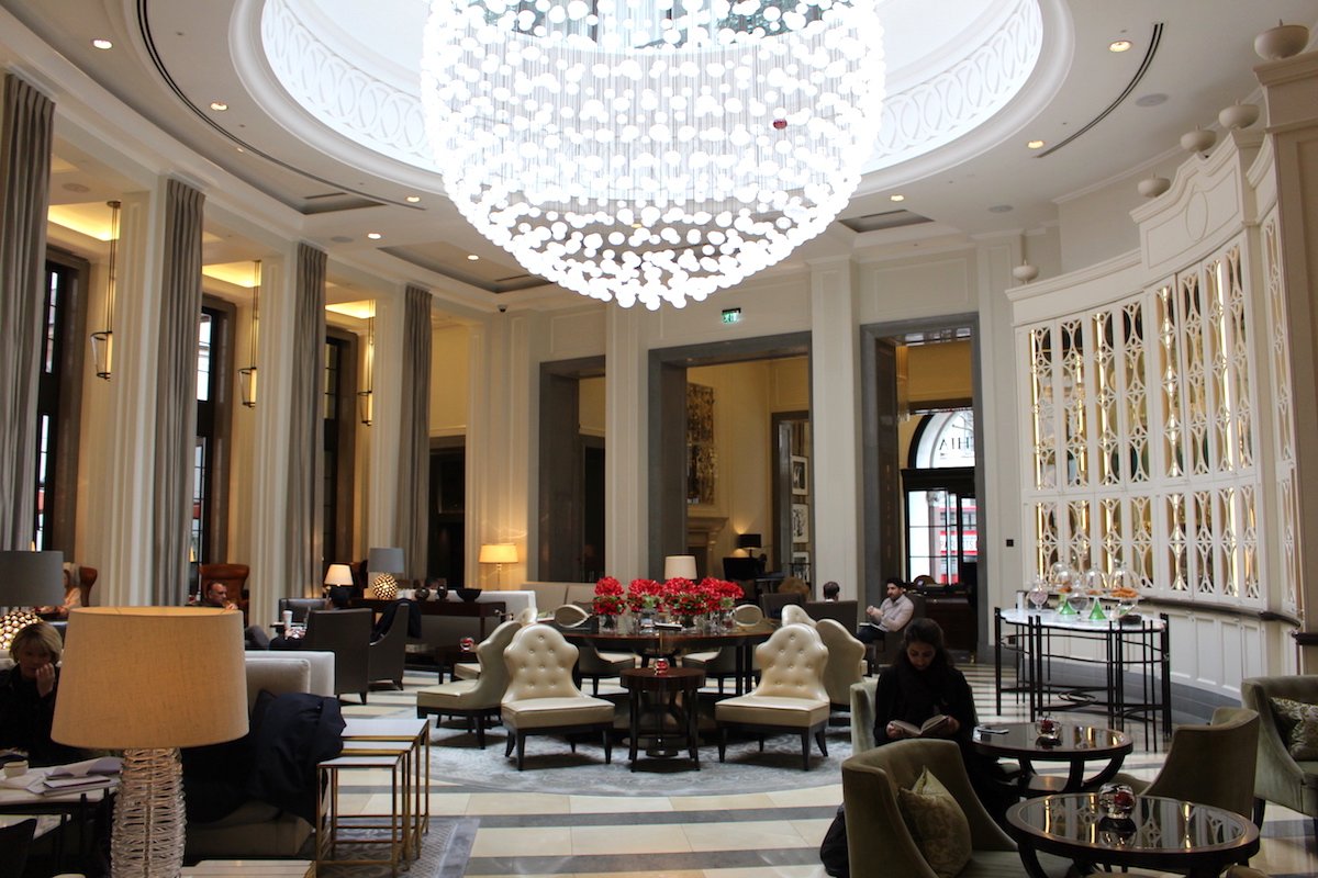 -and-carried-through-to-a-bright-atrium-with-a-stunning-chandelier