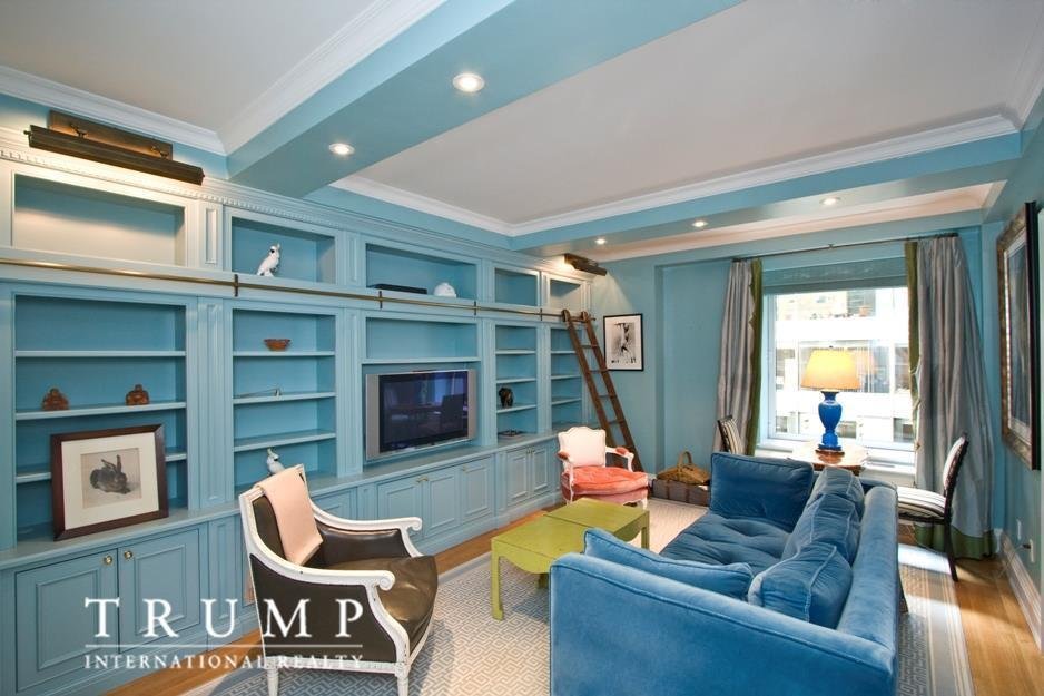 a-den-sits-off-the-living-room