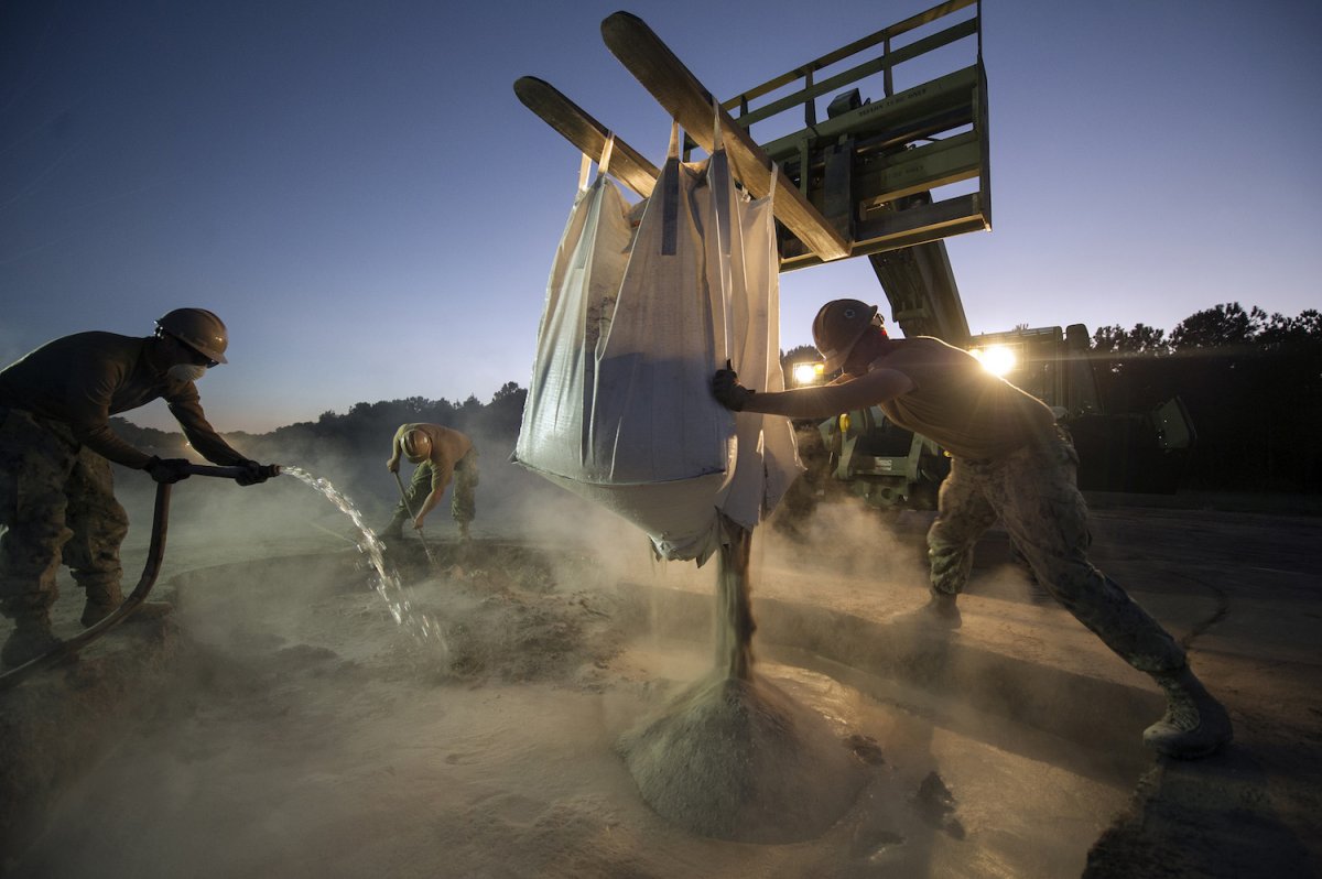 seabees-fill-a-crater-using-a-super-sack-during-a-rapid-airfield-damage-repair-exercise-on-october-17.jpg